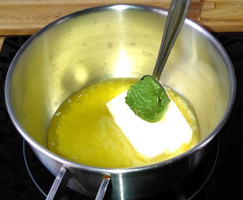 Lubina en salsa de cítricos, nata y mostaza verde